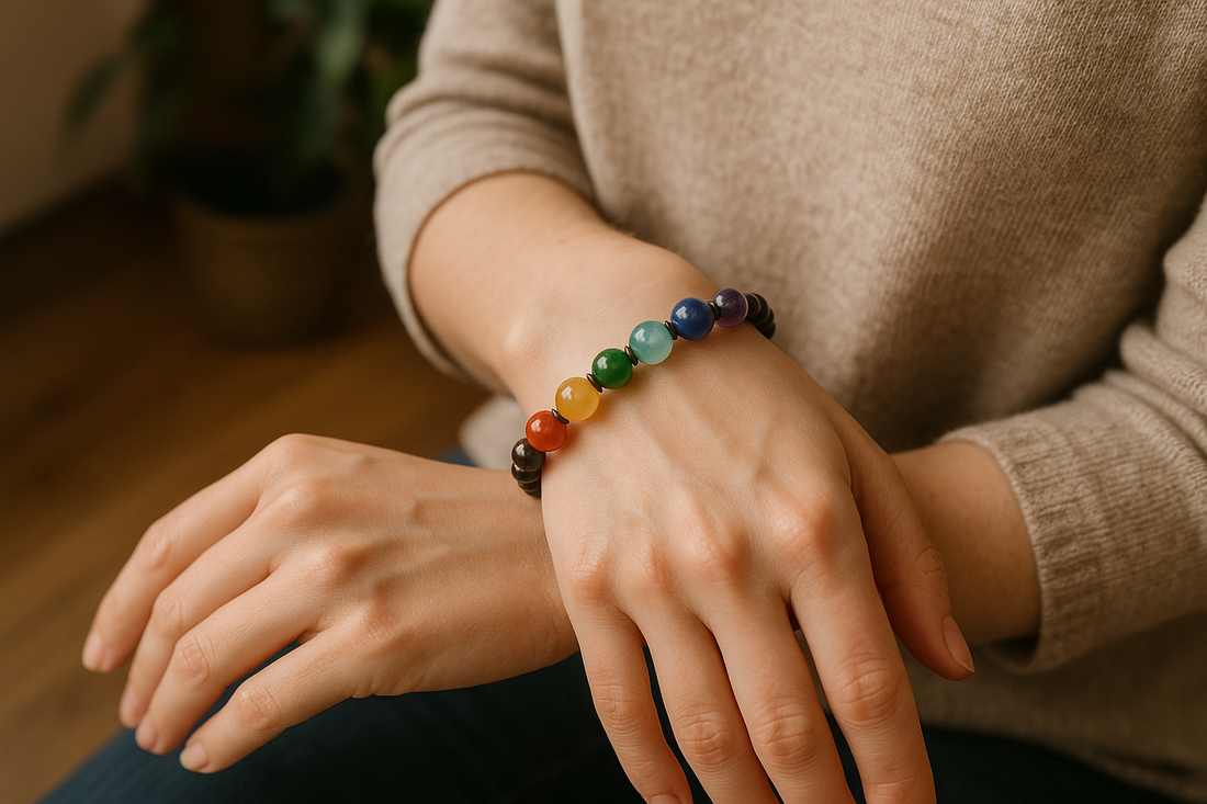 close up of a person wearing chakra bracelet