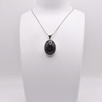 black star Pendant on jewelry display