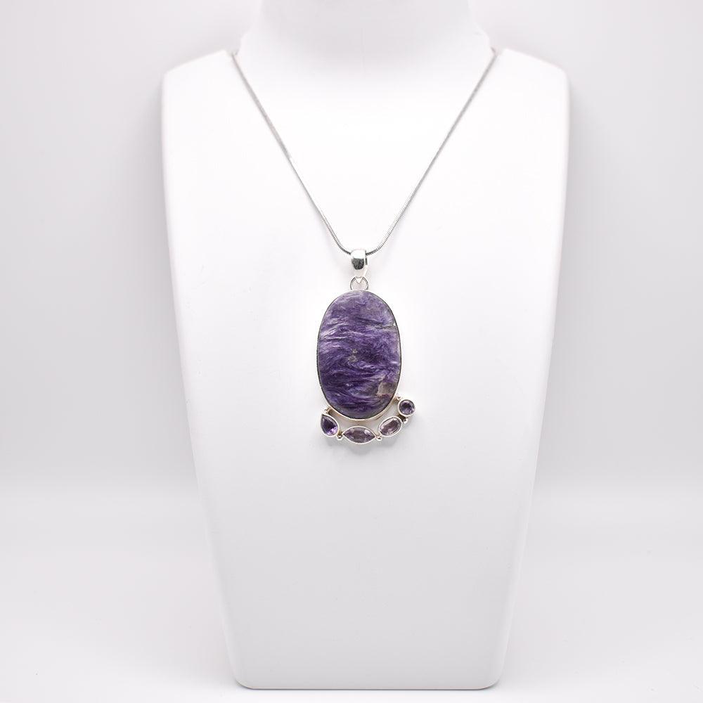 Chariot Pendant on jewelry display 