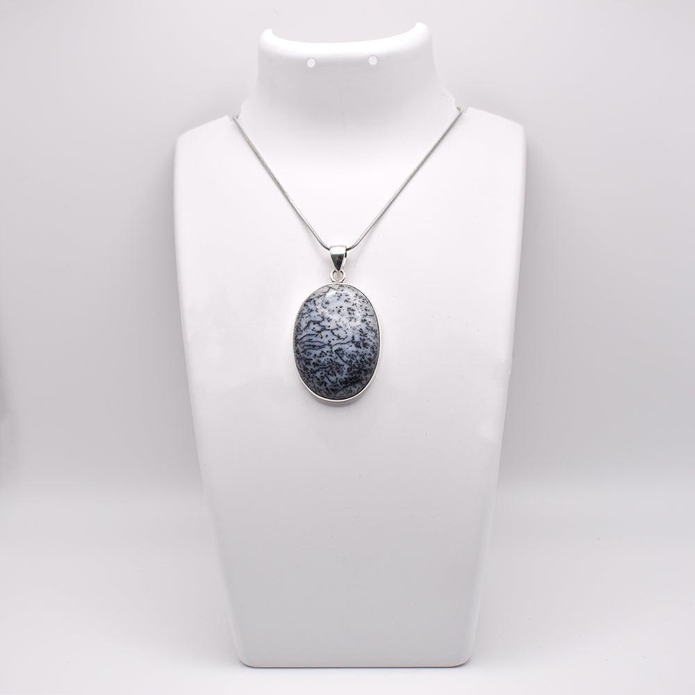 Dendritic Agate Pendant on jewelry display