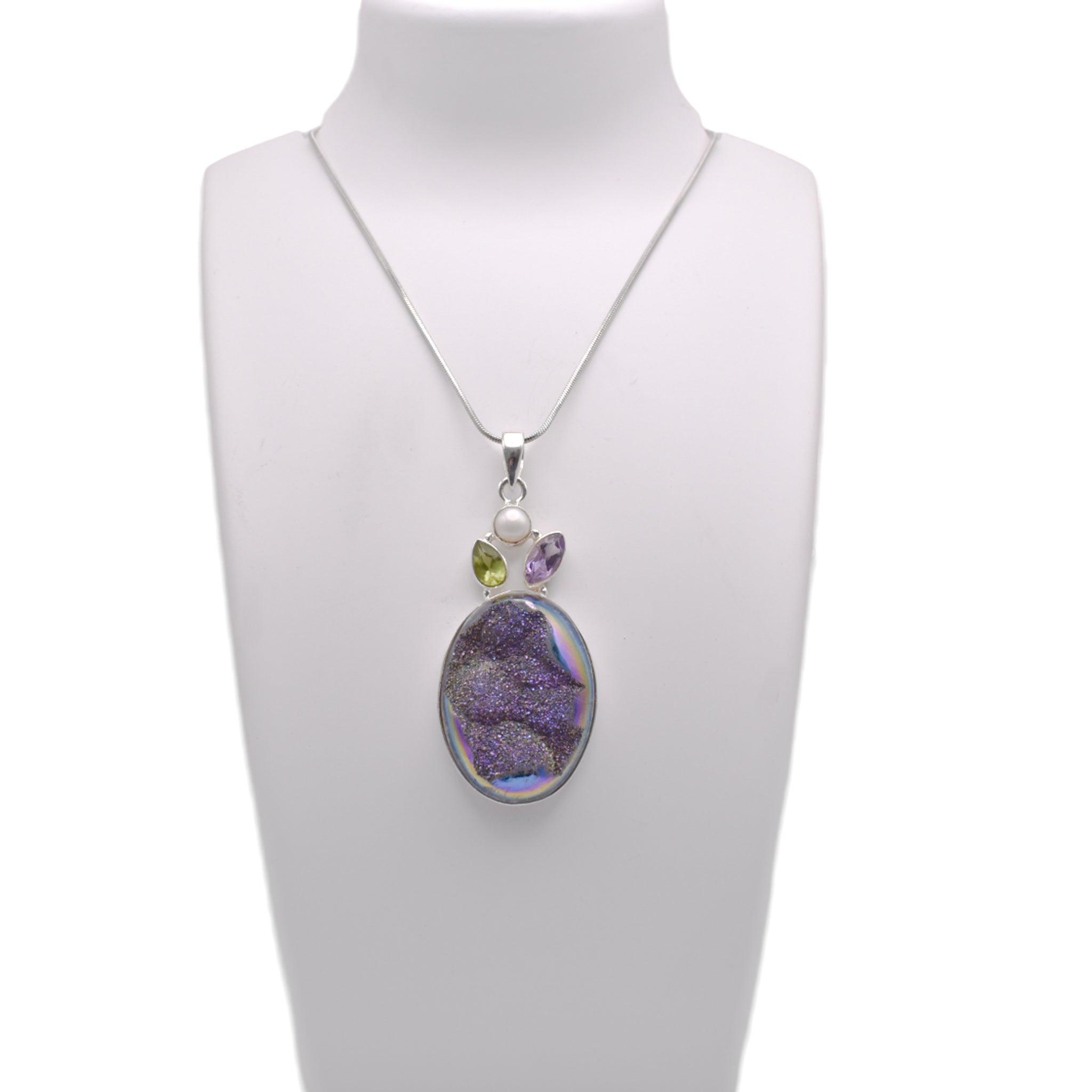 Druzy Pendant on jewelry display 