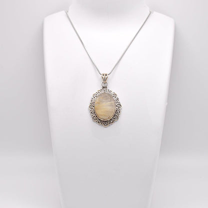 Golden Rutile Pendant with silver chain