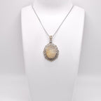 Golden Rutile Pendant with silver chain