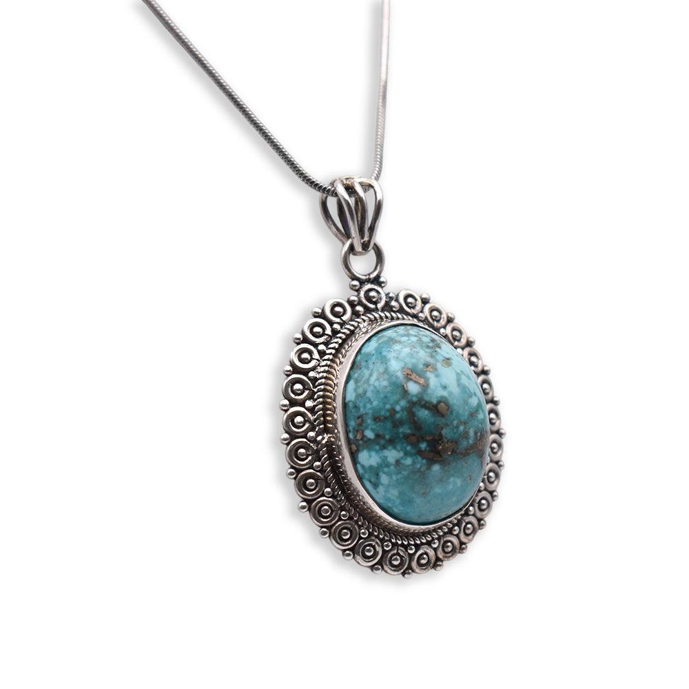 925 Sterling Silver blue colored oval shaped Iranian Turquoise Pendant side  angle