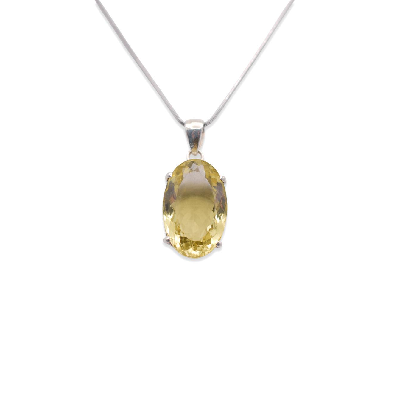 hanging 925 sterling silver lemon quartz pendant yellow color with silver chain on white background