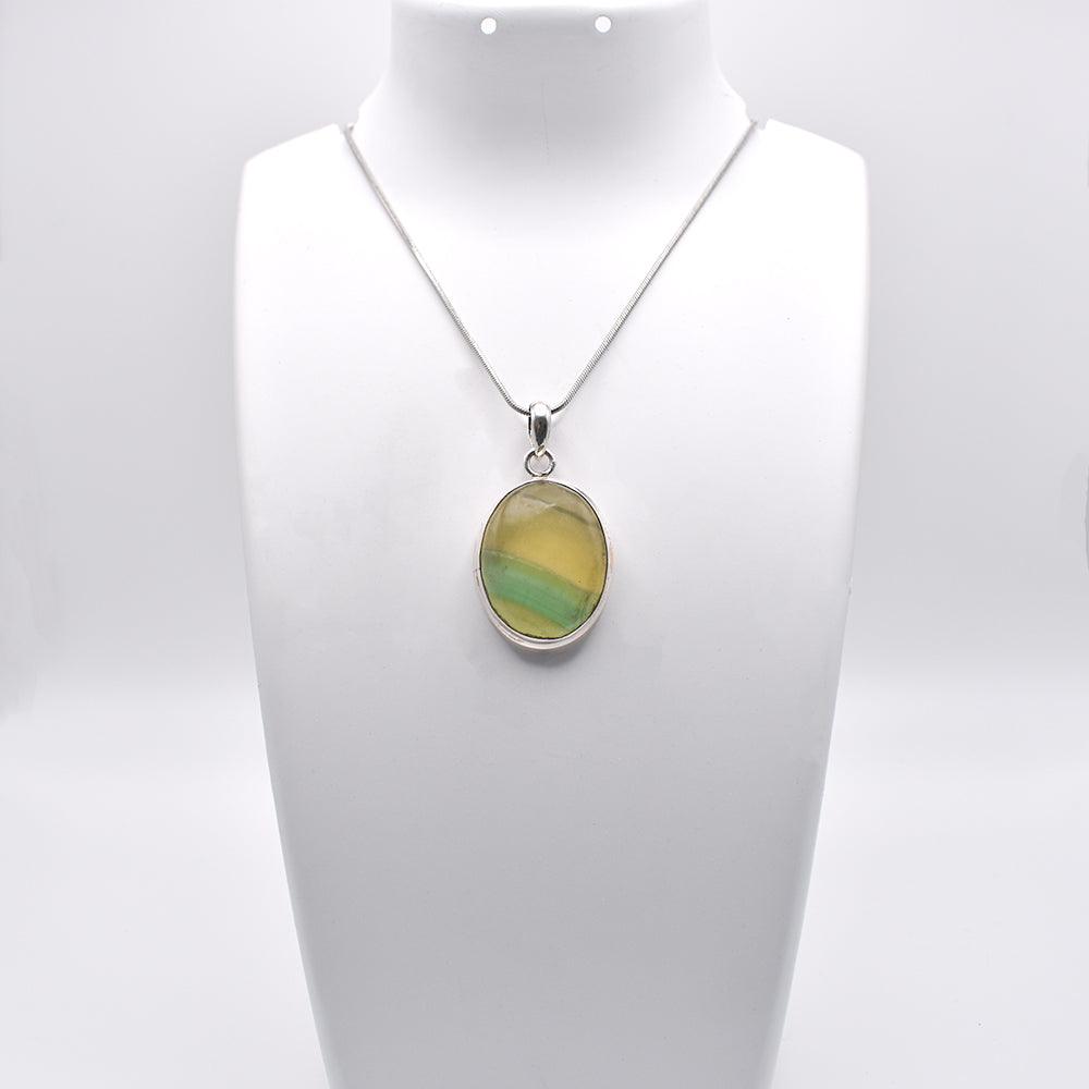 Multi Fluorite Pendant on jewelry display 