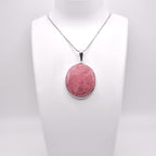 Rhodonite Pendant on jewelry display 