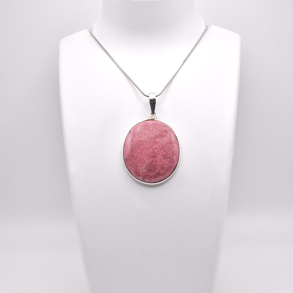 Rhodonite Pendant on jewelry display 