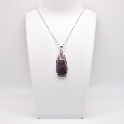 Ruby Pendant pear shaped on jewelry display