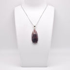 Ruby Pendant pear shaped on jewelry display