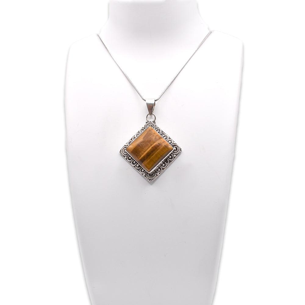 Hanging 925 sterling Silver tiger eye rhombus shaped Pendant on jewelry display 