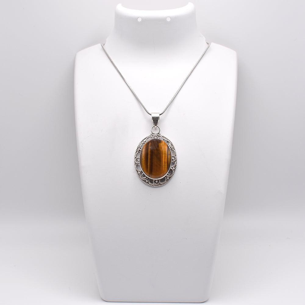 925 sterling Silver tiger eye oval shaped Pendant on jewelry display