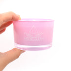Lavender crystal candle in pink frosted jar with raw crystals