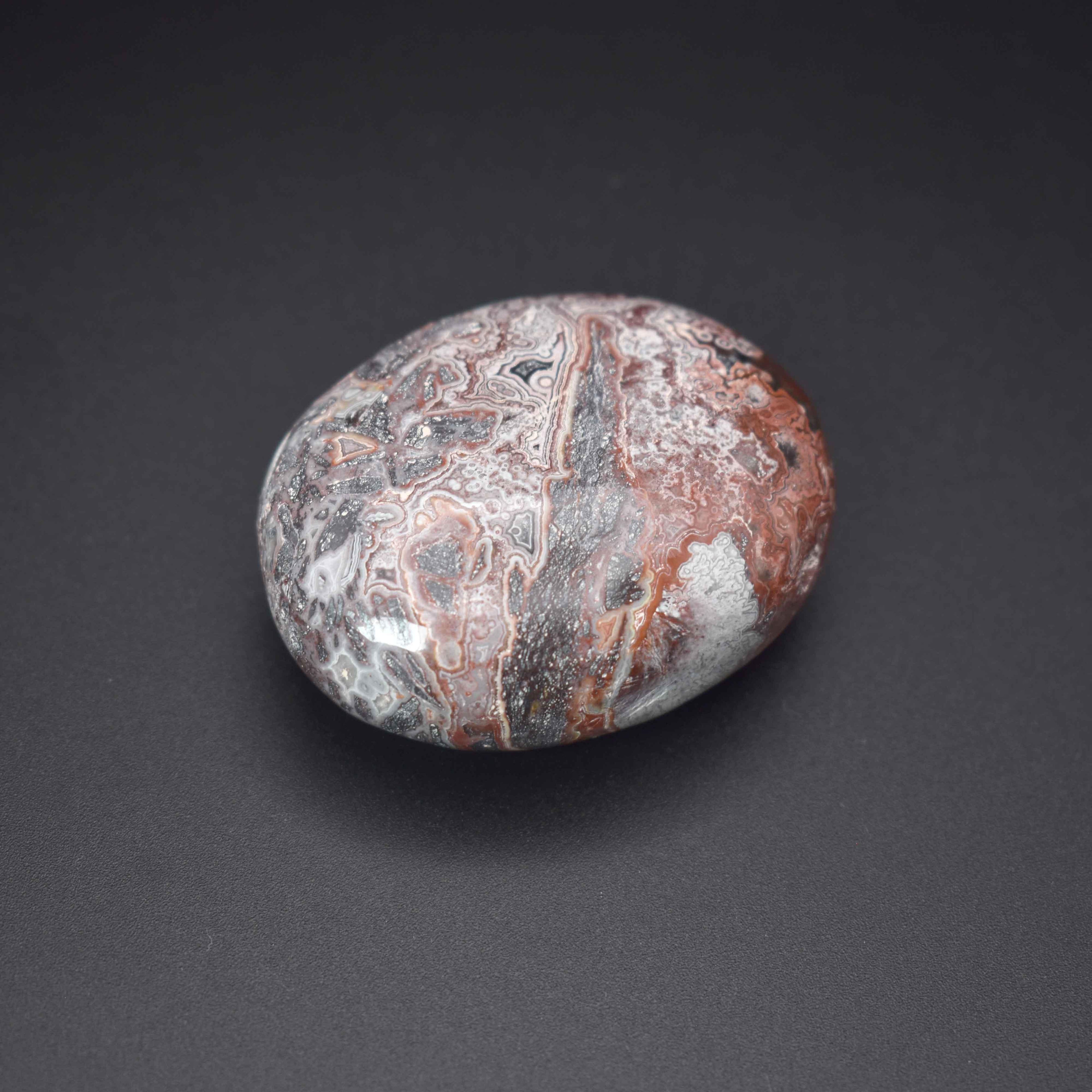 Crazy Lace Agate Palm Stone - Mystic Gleam