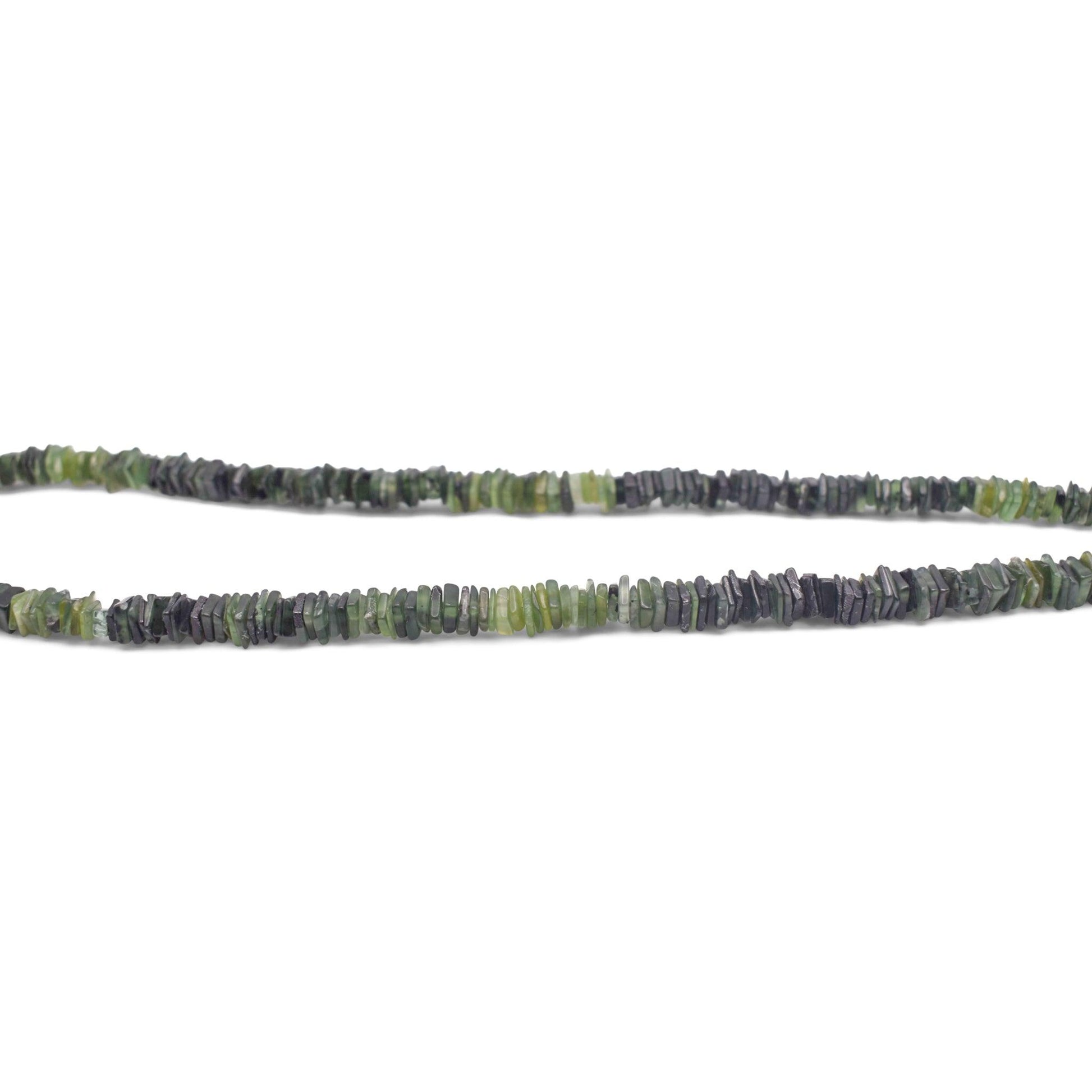 Serpentine-Heishi-Beads green and black color beads with white background