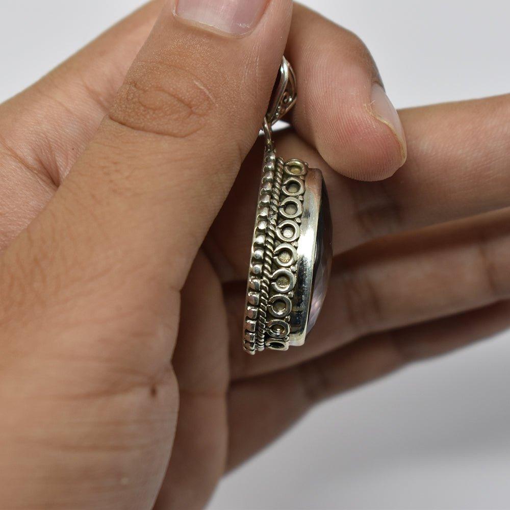 925 Sterling Silver Ametrine purple color pendant in hand side angle 