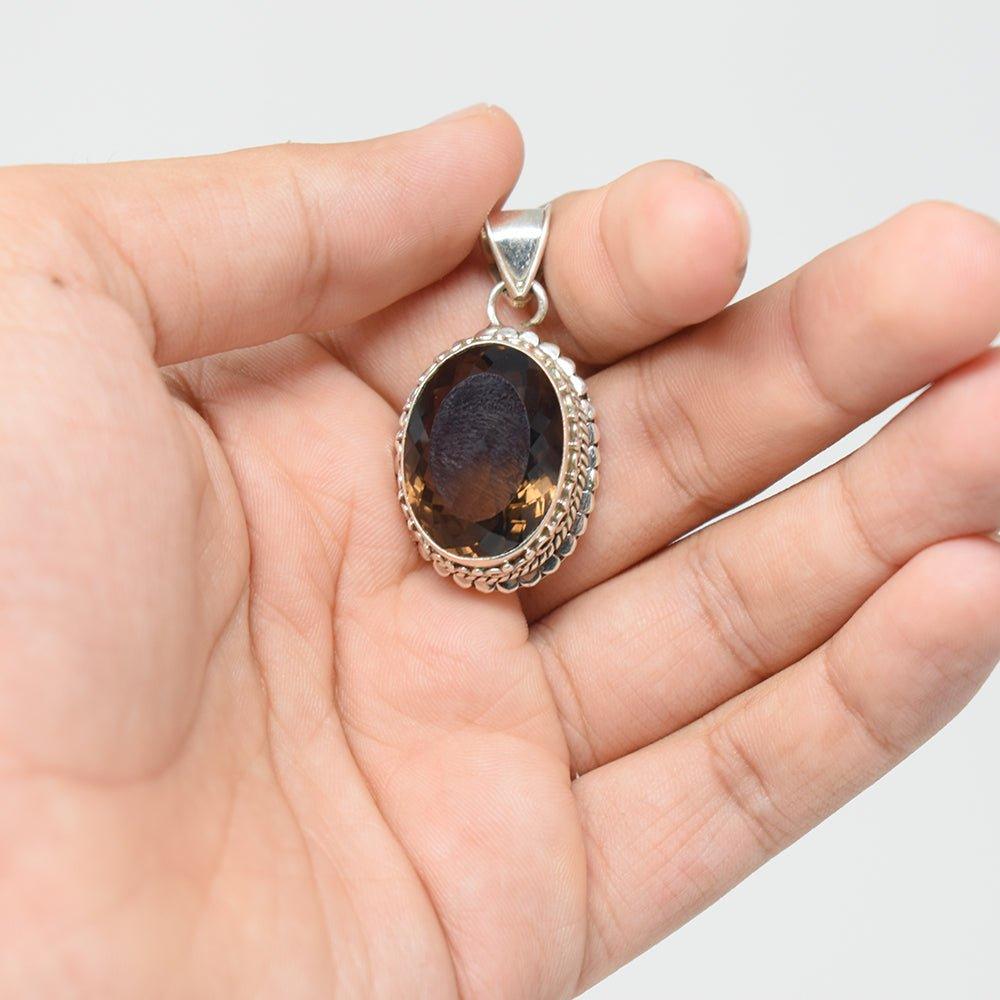 925 sterling Silver smokey topaz Pendant on hand front angle